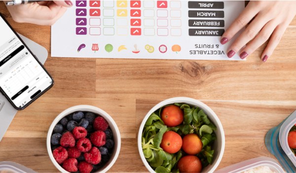 Person planning a diet, addressing weight management challenges.